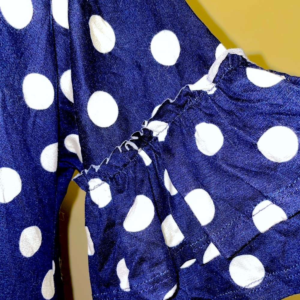 Navy blue polkadot top ruffled sleeve